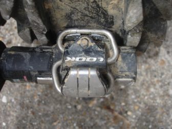 Tread and cleat pressing down onto the Look S-Track Race pedal