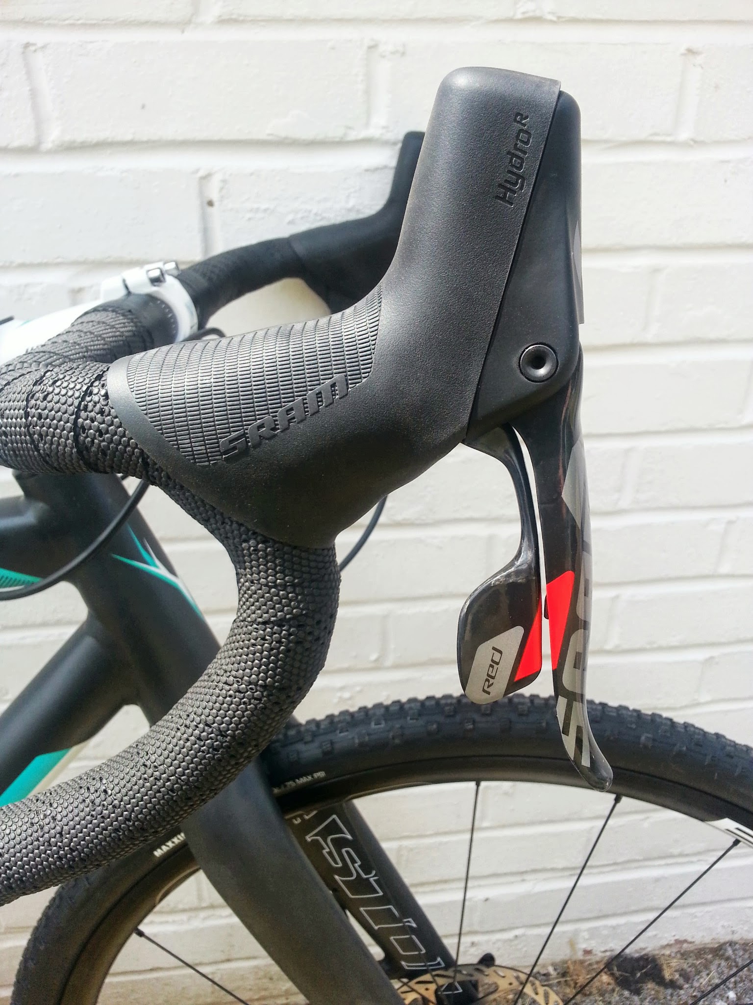 SRAM's Red22 levers have the hydraulic reservoir hidden inside, explaining their Frankenstein look