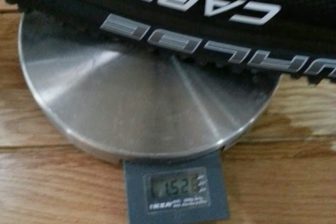 Carbon clincher rear wheel and tyre prior to sealant - 1528g.