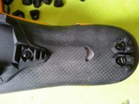 Rear of the sole has a small vent and two replaceable 'spikes'