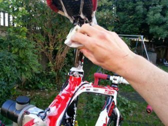 Start at the top of the frame and clean downwards