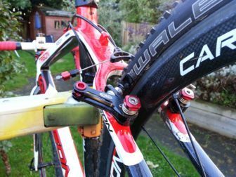 You'll need to release your brakes to get your wheels out...