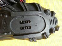 Cleat pocket is surrounded by aggressive tread