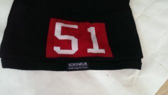 Soigneur's own logo is small and discreet