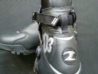 MXZ303 is a tall, thin boot when seen from behind