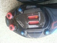 The cleat area of the Shimano XC90's sole is beautiful naked carbon-composite weave.