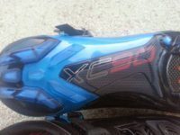 The carbon on the mid-sole is covered with a transparent, non-slip, bumpy-surfaced polyurethane moulding