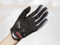 Gloves are a tight fit and require a hard pull to get them on