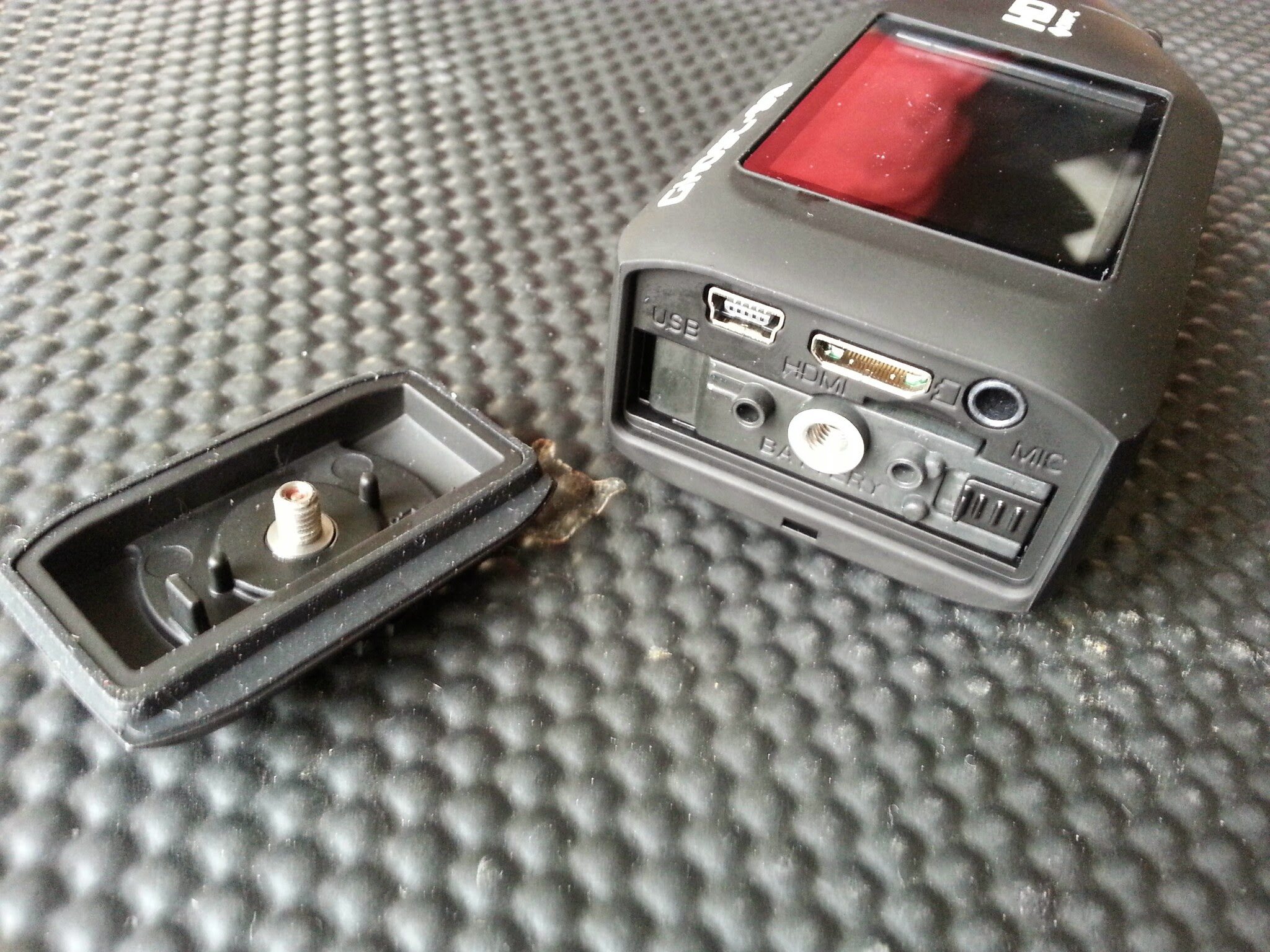 Well sealed rear hatch comes off to reveal SD card slot, usb port, battery slot and so on.