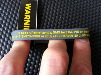 Wrist band contains clear instructions for the emergency services