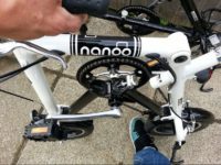 To unfold you simply push the rear wheel with your foot...