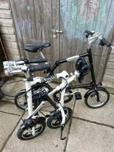 White FB12 folded in front of unfolded black FB14