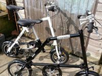 The black Nanoo in the foreground is a 14" model with cable operated disc brakes
