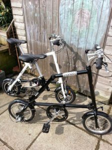 The black Nanoo in the foreground is a 14" model with cable operated disc brakes