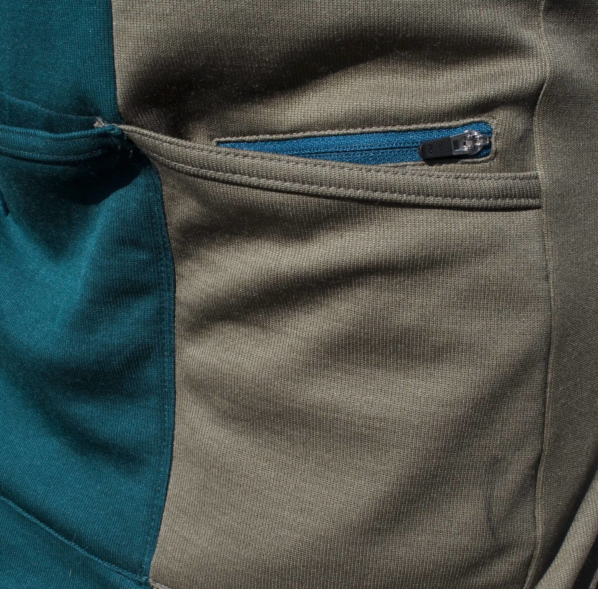 Isadore Asymmetric Jersey rear pocket with valuables and phone/ipod holder