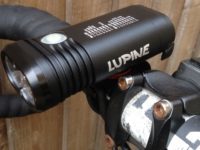Slightly tilted down is best to avoid blinding other road users