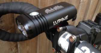 Slightly tilted down is best to avoid blinding other road users