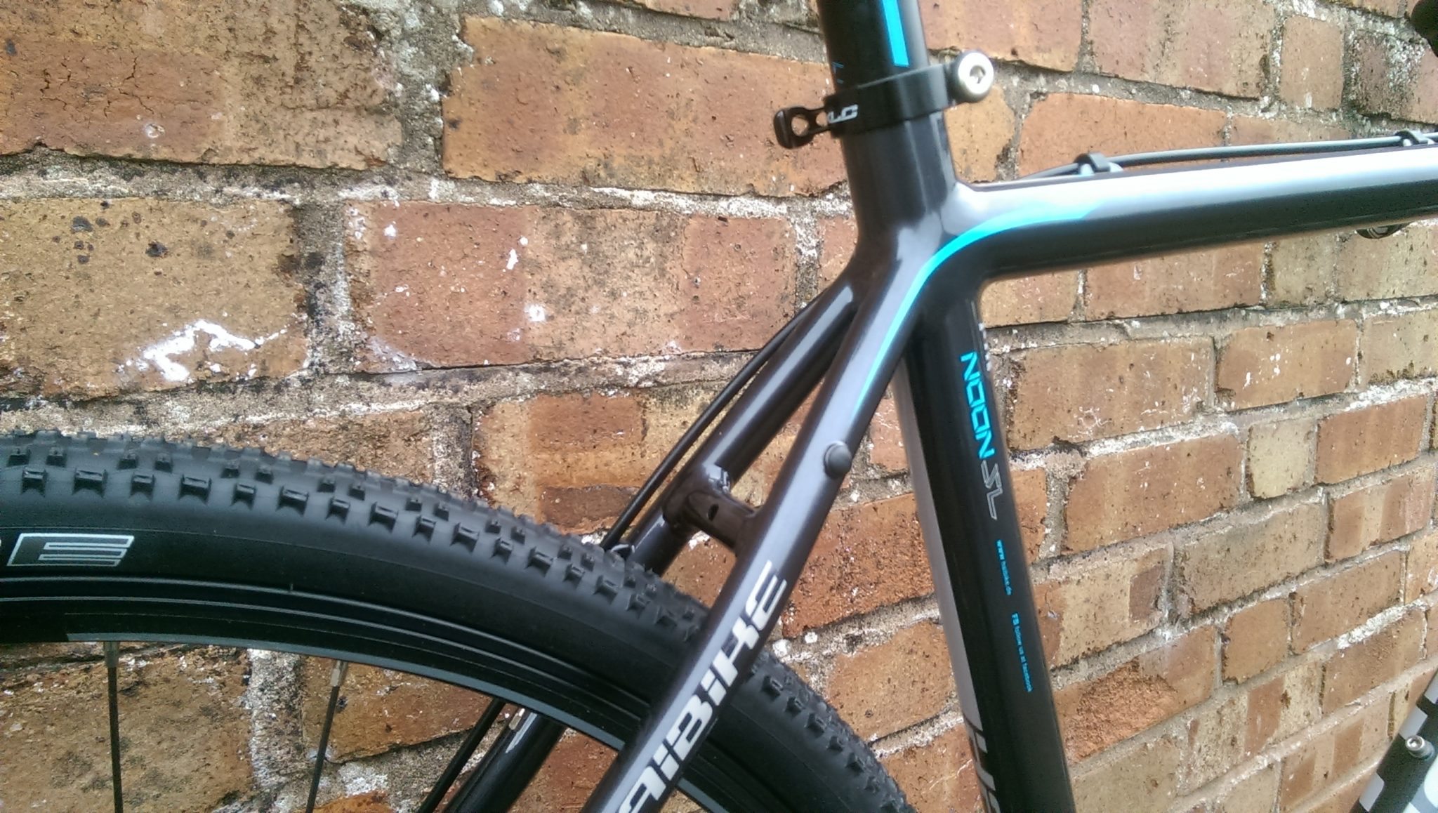 A forward facing seat clamp to keep out the muck, mudguard fittings and some smooth welds