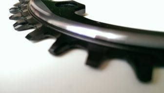 Specially profiled teeth help keep the chain in place.