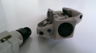 Release pressure can be altered using the small screw on the left. Gently does it though, as it is only plastic.