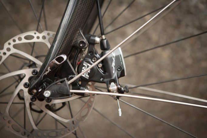 A barrel adjuster allows you to take out any cable slack, pad wear  is compensated for by the HY/RDs being an open system