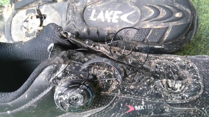 BOA closures up close, with splattering of authentic Sussex mud. The steel lace can be easily loosened by pulling on the plastic puller