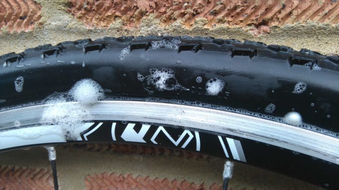 When trying to convert standard tyres to tubeless, you'll often get bubbles forming on the sidewalls as they are porous. They might seal in time, or maybe not...