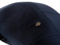 Svelte's signature brass button helps keep your valuables safe and looks good