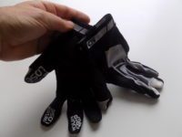 Magnetic tabs on the cuffs help keep the gloves together