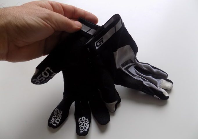 Magnetic tabs on the cuffs help keep the gloves together