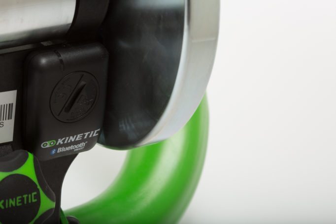 The Kinetic Road Machine Smart connects to your device via a Bluetooth sensor