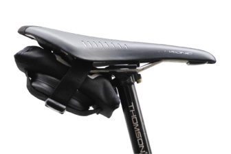 The tool roll comes with a strap to hold a spare inner tube and attach it under your saddle