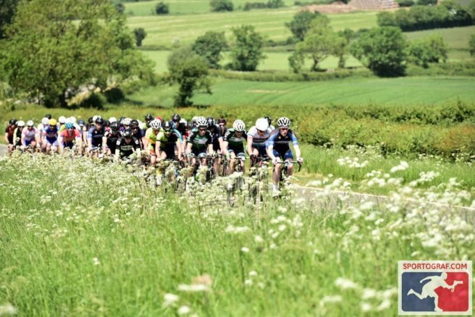 Early on and the route rolls through some pretty countryside. Photo courtesy of Sportograf