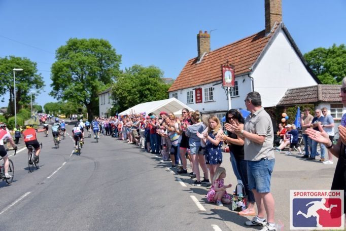 The locals were out on the roadside, cheering the riders on. Photo courtesy of Sportograf