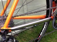 Bare steel chainstay