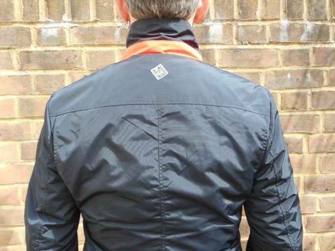 Fold up the collar for a little Hi-viz detail. The cut across the back allows for a relaxed riding position
