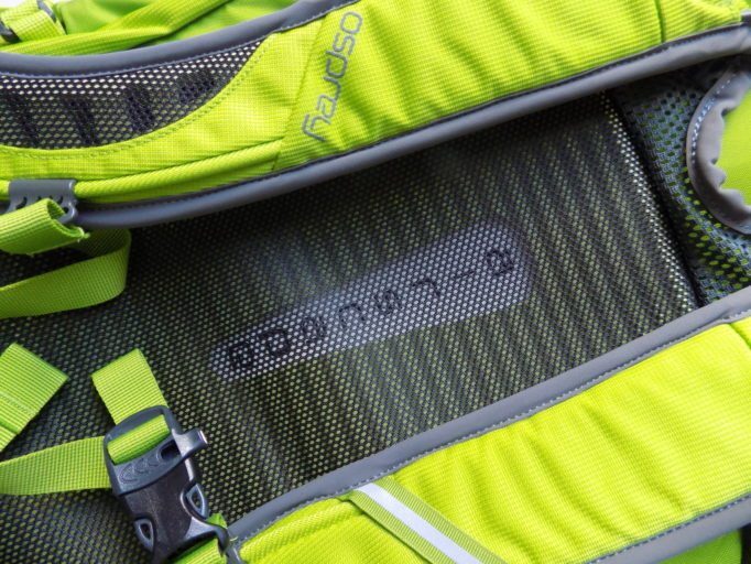 A ridged and shaped foam back makes for a comfortable carry. The straps also use foam. Cut outs and mesh on both help with heat control. And there's a whistle on the chest strap!