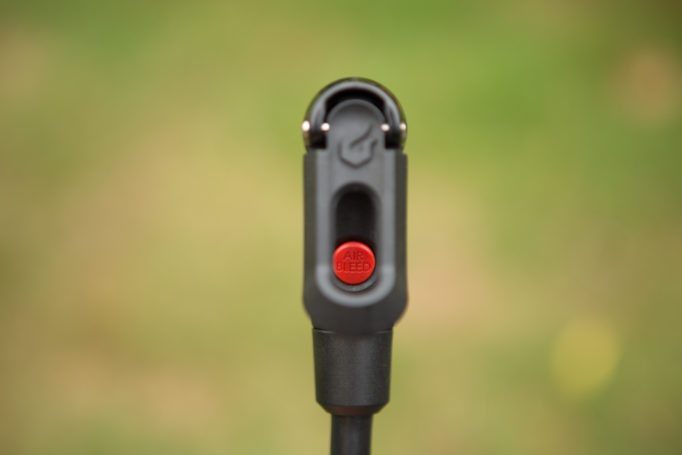 The bleed valve sits under the head's lever and allows for precise pressure setting