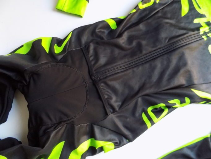 The top of the skinsuit is a like a jacket and the bottom edge makes pee stops easier, for the boys