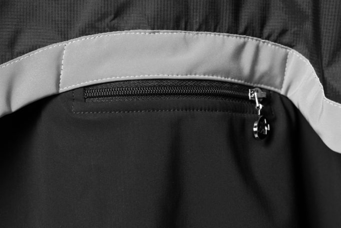 Reflective details on the back and a zipped pocket