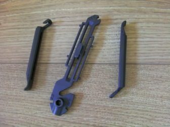 The tyre levers form part of the handle when not in use