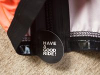 detail of the have a good ride tagline on the zipper of the Equipe RS cycling jacket