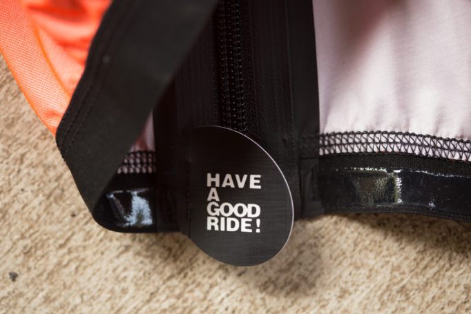 detail of the have a good ride tagline on the zipper of the Equipe RS cycling jacket