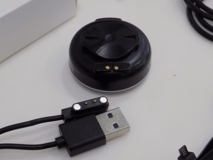 Charging is via a magnetic clamp