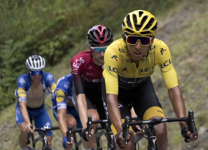 Egan Bernal wearing the yellow leaders jersey and Oakley Sutro Glasses in the 2019 Tour de France